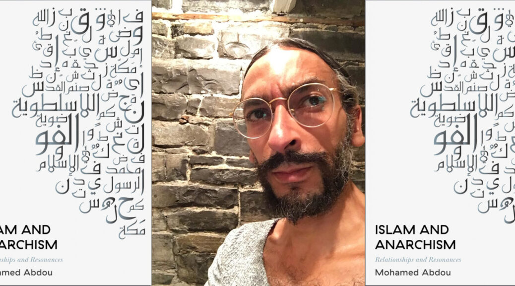 Mohamed Abdou flanked by images of his book